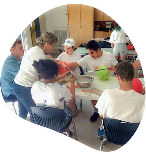 A inclusive group of people creating art together