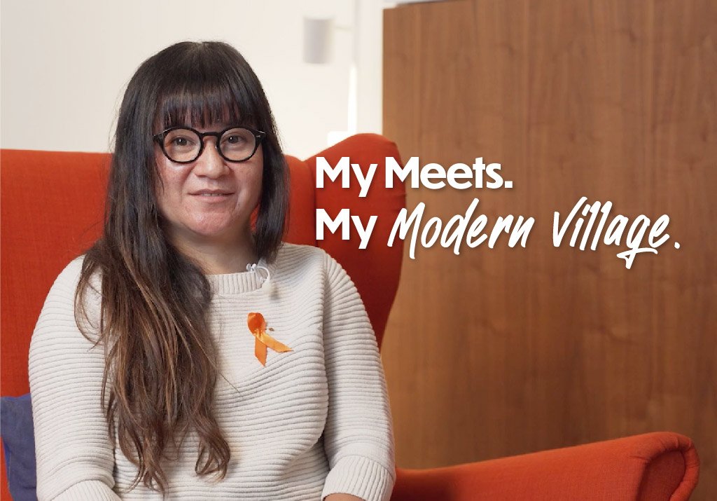 A woman with long brown hair, bangs and glasses. Reads: My Meets. My Modern Village. Links to her testimonial about AutismBC Meets